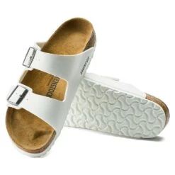 Birkenstock Women's Arizona Birko Flor Sandal- White- Medium/Narrow -BROOKS Sales Shop 552683 sole