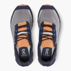 On Running Women's Cloudvista Trail Shoe - Midnight/Copper- Regular (B) 10 On Running Women's Cloudvista Trail Shoe - Midnight/Copper- Regular (B) -BROOKS Sales Shop 64.98592 cloudvista fw22 midnight copper w g2