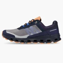 On Running Women's Cloudvista Trail Shoe - Midnight/Copper- Regular (B) 11 On Running Women's Cloudvista Trail Shoe - Midnight/Copper- Regular (B) -BROOKS Sales Shop 64.98592 cloudvista fw22 midnight copper w g4
