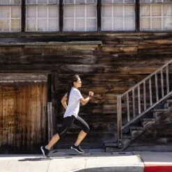 Topo Athletic Women's Ultrafly 4 Running Shoe - Black/White- Regular (B) -BROOKS Sales Shop W056.Black White 10